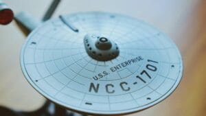 round gray USS Enterprise aircraft scale model